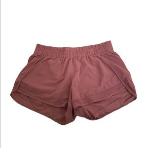 Pink Workout Lululemon Hotty Hot Dupes.  Size medium.  Great quality.